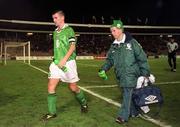 18 November 1998; Ireland captain Roy Keane leaves the field with Charlie O'Leary, Equipment Officer, following the UEFA Euro 2000 Group 8 Qualifier between Yugoslavia and Republic of Ireland at the Red Star Stadium, in Belgrade, Yugoslavia. Photo by David Maher/Sportsfile