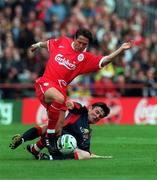 31 July 1998; Oyvind Leonhardsen of Liverpool is tackled by Martin Russell of St Patrick's Athletic during the Carlsberg Trophy match between St Patrick's Athletic and Liverpool at Lansdowne Road in Dublin. Photo by Matt Browne/Sportsfile