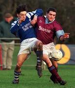 13 January 1999; Pat Keane of Cobh Ramblers in action against Sean Mulhall of Garda AFC during the Harp Lager League Cup First Round Replay match between Garda AFC and Cobh Ramblers at Westmanstown Sports Complex in Dublin. Photo by Matt Browne/Sportsfile