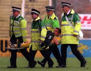 18 July 1998; Victor Segura of Norwich City is stretchered off the pitch after picking up an injury during the Club Friendly match between St Patrick's Athletic and Norwich City at Richmond Park in Dublin. Photo By Brendan Moran/Sportsfile.