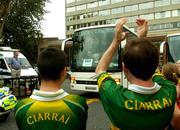 27 September 2004; Kerry supporters applaud as the 2004 Bank of Ireland All-Ireland Football Champions Kerry depart, by bus, from the Burlington Hotel, Dublin. Picture credit; Damien Eagers / SPORTSFILE