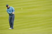 28 September 2004; Paul McGinley pitches onto the 5th green during the first day of practice ahead of the American Express World Golf Championship 2004, Mount Juliet Golf Club, Thomastown, Co. Kilkenny. Picture credit; Matt Browne / SPORTSFILE