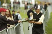 28 September 2004; Sergio Garcia signs an autograph on the way to the first tee box during the first day of practice ahead of the American Express World Golf Championship 2004, Mount Juliet Golf Club, Thomastown, Co. Kilkenny. Picture credit; Matt Browne / SPORTSFILE