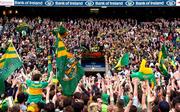 26 September 2004; Kerry fans celebrate as captain Dara O Cinneide prepares to lift the Sam Maguire cup. Bank of Ireland All-Ireland Senior Football Championship Final, Kerry v Mayo, Croke Park, Dublin. Picture credit; Ray McManus / SPORTSFILE *** Local Caption *** Any photograph taken by SPORTSFILE during, or in connection with, the 2004 Bank of Ireland All-Ireland Senior Football Final which displays GAA logos or contains an image or part of an image of any GAA intellectual property, or, which contains images of a GAA player/players in their playing uniforms, may only be used for editorial and non-advertising purposes.  Use of photographs for advertising, as posters or for purchase separately is strictly prohibited unless prior written approval has been obtained from the Gaelic Athletic Association.