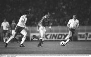 28 October 1980; Maxime Bossis, France, in action against kevin Moran, left, and Mark Lawrenson, Republic of Ireland. 1982 FIFA World Cup Qualifier, France v Republic of Ireland, Parc de Princes, Paris, France. Picture credit; Ray McManus / SPORTSFILE