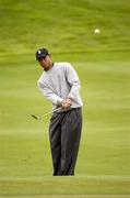 29 September 2004; Tiger Woods pitches onto the 5th green during the second day of practice ahead of the American Express World Golf Championship 2004, Mount Juliet Golf Club, Thomastown, Co. Kilkenny. Picture credit; Matt Browne / SPORTSFILE