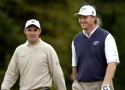 29 September 2004; Padraig Harrington pictured with Ernie Els, right, on their way to the 6th green during the second day of practice ahead of the American Express World Golf Championship 2004, Mount Juliet Golf Club, Thomastown, Co. Kilkenny. Picture credit; Matt Browne / SPORTSFILE