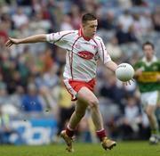 26 September 2004; Colm Cavanagh, Tyrone. All-Ireland Minor Football Championship Final, Kerry v Tyrone, Croke Park, Dublin. Picture credit; Brian Lawless / SPORTSFILE *** Local Caption *** Any photograph taken by SPORTSFILE during, or in connection with, the 2004 All-Ireland Minor Football Final which displays GAA logos or contains an image or part of an image of any GAA intellectual property, or, which contains images of a GAA player/players in their playing uniforms, may only be used for editorial and non-advertising purposes.  Use of photographs for advertising, as posters or for purchase separately is strictly prohibited unless prior written approval has been obtained from the Gaelic Athletic Association.