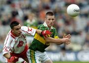 26 September 2004; Shane Murphy, Kerry, in action against Niall McGinn, Tyrone. All-Ireland Minor Football Championship Final, Kerry v Tyrone, Croke Park, Dublin. Picture credit; Damien Eagers / SPORTSFILE *** Local Caption *** Any photograph taken by SPORTSFILE during, or in connection with, the 2004 All-Ireland Minor  Football Final which displays GAA logos or contains an image or part of an image of any GAA intellectual property, or, which contains images of a GAA player/players in their playing uniforms, may only be used for editorial and non-advertising purposes.  Use of photographs for advertising, as posters or for purchase separately is strictly prohibited unless prior written approval has been obtained from the Gaelic Athletic Association.