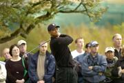30 September 2004; Tiger Woods watches his drive from the 9th tee box during round one of the American Express World Golf Championship 2004, Mount Juliet Golf Club, Thomastown, Co. Kilkenny. Picture credit; Matt Browne / SPORTSFILE