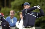 30 September 2004; Paul McGinley watches his drive from the 18th tee box during round one of the American Express World Golf Championship 2004, Mount Juliet Golf Club, Thomastown, Co. Kilkenny. Picture credit; Matt Browne / SPORTSFILE