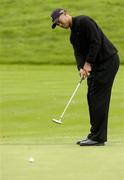 30 September 2004; Tiger Woods watches his putt on the 17th green during round one of the American Express World Golf Championship 2004, Mount Juliet Golf Club, Thomastown, Co. Kilkenny. Picture credit; Matt Browne / SPORTSFILE