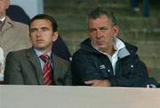 30 September 2004; Pat Fenlon, left , Shelbourne manager, watches the game from the stands alongside club official Dave Henderson. UEFA cup, First Round, Second Leg, Lille v Shelbourne, Stade Metropole, Lille, France. Picture credit; David Maher / SPORTSFILE
