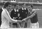 14 October 1981; Republic of Ireland captain Liam Brady shakes hands with France captain Michel Platini in the presence of Referee Rolf Ericsson. 1982 FIFA World Cup Qualifier, Republic of Ireland v France, Lansdowne Road, Dublin. Picture credit: Ray McManus / SPORTSFILE