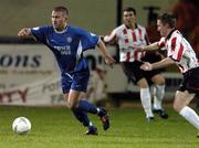 1 October 2004; Alan Reynolds, Waterford United, in action against Eamon Doherty, Derry City. FAI Carlsberg Cup Semi-Final, Derry City v Waterford United, Brandywell, Derry. Picture credit; David Maher / SPORTSFILE