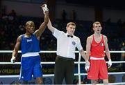 16 October 2013; Adam Nolan, Bray BC, Co. Wicklow, representing Ireland, right, after his defeat by Souleymane Cissokho, France, in their Welterweight 69Kg Last 64 bout. AIBA World Boxing Championships Almaty 2013, Almaty, Kazakhstan. Photo by Sportsfile