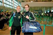 16 October 2013; Waterford's Shane O'Sullivan, left, and Antrim's Neil McManus as the GAA Hurling 11 Teams prepare to depart for the Notre Dame Celtic Champions Classic Super Hurling 11s Exhibition matches. Dublin Airport, Dublin. Picture credit: Pat Murphy / SPORTSFILE