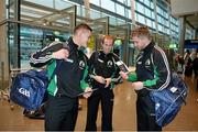 16 October 2013; Lee Chin, Wexford, left, Niall Kealy, and Aidan Harte, Galway, right, as the GAA Hurling 11 Teams prepare to depart for the Notre Dame Celtic Champions Classic Super Hurling 11s Exhibition matches. Dublin Airport, Dublin. Picture credit: Pat Murphy / SPORTSFILE
