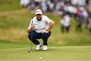 19 July 2025; Shane Lowry of Ireland lines up a putt on the first green during day three of The 153rd Open Championship at Royal Portrush Golf Club in Portrush, Antrim. Photo by Ramsey Cardy/Sportsfile