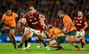 19 July 2025; Ellis Genge of British & Irish Lions is tackled by Jake Gordon of Australia during the first test match between Australia and the British & Irish Lions at Suncorp Stadium in Brisbane, Australia. Photo by Brendan Moran/Sportsfile