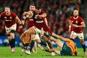 19 July 2025; Ellis Genge of British & Irish Lions is tackled by Jake Gordon of Australia during the first test match between Australia and the British & Irish Lions at Suncorp Stadium in Brisbane, Australia. Photo by Brendan Moran/Sportsfile