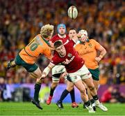 19 July 2025; Tommy Freeman of British & Irish Lions in action against Tom Lynagh of Australia during the first test match between Australia and the British & Irish Lions at Suncorp Stadium in Brisbane, Australia. Photo by Brendan Moran/Sportsfile