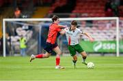 19 July 2025; Kitt Nelson of Cork City is tackled by Eoghan Hennessy of Leicester Celtic during the Sports Direct Men’s FAI Cup second round match between Cork City and Leicester Celtic at Turner’s Cross in Cork. Photo by Stephen McCarthy/Sportsfile