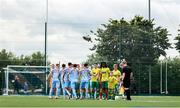 19 July 2025; Players and match officials shake hands before the Sports Direct Men’s FAI Cup second round match between Bangor Celtic and Cobh Ramblers at Pearse Park in Crumlin, Dublin. Photo by Thomas Flinkow/Sportsfile