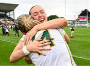 19 July 2025; Meath players Sarah Wall, behind, and Vikki Wall celebrate after their side's victory in the TG4 All-Ireland Ladies Football Senior Championship semi-final match between Meath and Kerry at Glenisk O’Connor Park in Tullamore, Offaly. Photo by Piaras Ó Mídheach/Sportsfile