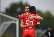 19 July 2025; John Martin of Shelbourne celebrates after scoring his side's fourth goal with team-mate Derin Adewale, left, during the Sports Direct Men’s FAI Cup second round match between Fairview Rangers and Shelbourne at Singland Park in Limerick. Photo by Stephen McCarthy/Sportsfile