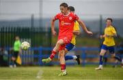 19 July 2025; John Martin of Shelbourne shoots to score his side's fourth goal during the Sports Direct Men’s FAI Cup second round match between Fairview Rangers and Shelbourne at Singland Park in Limerick. Photo by Stephen McCarthy/Sportsfile