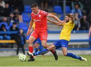 19 July 2025; Dan Ring of Shelbourne is tackled by Oleg Vysochan of Fairview Rangers during the Sports Direct Men’s FAI Cup second round match between Fairview Rangers and Shelbourne at Singland Park in Limerick. Photo by Stephen McCarthy/Sportsfile