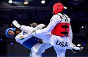 20 July 2025; Leroy Nsilu Dilandu, from Citywest in Dublin, representing Technological University Dublin and Ireland, in action against Isaiah Michael Young, representing University of North Carolina at Charlotte and Team USA, during the men's -80kg match on day four of the FISU World University Games 2025 at Messe Essen Halle in Essen, Germany. Photo by Shauna Clinton/Sportsfile