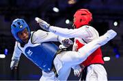 20 July 2025; Leroy Nsilu Dilandu, from Citywest in Dublin, representing Technological University Dublin and Ireland, in action against Isaiah Michael Young, representing University of North Carolina at Charlotte and Team USA, during the men's -80kg match on day four of the FISU World University Games 2025 at Messe Essen Halle in Essen, Germany. Photo by Shauna Clinton/Sportsfile