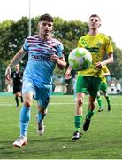 19 July 2025; John O'Donovan of Cobh Ramblers in action against Bradley Rogers Burchett of Bangor Celtic during the Sports Direct Men’s FAI Cup second round match between Bangor Celtic and Cobh Ramblers at Pearse Park in Crumlin, Dublin. Photo by Thomas Flinkow/Sportsfile