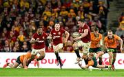 19 July 2025; Jack Conan of British & Irish Lions is tackled by Tate McDermott of Australia during the first test match between Australia and the British & Irish Lions at Suncorp Stadium in Brisbane, Australia. Photo by Brendan Moran/Sportsfile