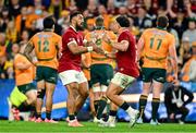 19 July 2025; Bundee Aki of British & Irish Lions, left, comes on as a substitute for teammate Sione Tuipulotu during the first test match between Australia and the British & Irish Lions at Suncorp Stadium in Brisbane, Australia. Photo by Brendan Moran/Sportsfile
