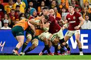 19 July 2025; Nick Champion de Crespigny of Australia Tadhg Beirne and Dan Sheehan of British & Irish Lions during the first test match between Australia and the British & Irish Lions at Suncorp Stadium in Brisbane, Australia. Photo by Brendan Moran/Sportsfile
