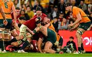 19 July 2025; Tom Curry of British & Irish Lions, hidden, with the help of teammate Jack Conan, scores his side's second try during the first test match between Australia and the British & Irish Lions at Suncorp Stadium in Brisbane, Australia. Photo by Brendan Moran/Sportsfile