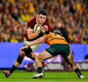 19 July 2025; Dan Sheehan of British & Irish Lions is tackled by Harry Potter of Australia during the first test match between Australia and the British & Irish Lions at Suncorp Stadium in Brisbane, Australia. Photo by Brendan Moran/Sportsfile