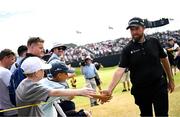 20 July 2025; Shane Lowry of Ireland with supporters during the final round of The 153rd Open Championship at Royal Portrush Golf Club in Portrush, Antrim. Photo by Ramsey Cardy/Sportsfile