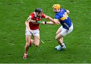 20 July 2025; Robert Downey of Cork in action against Jake Morris of Tipperary during the GAA Hurling All-Ireland Senior Championship final match between Cork and Tipperary at Croke Park in Dublin. Photo by Daire Brennan/Sportsfile