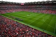 20 July 2025; The Cork and Tipperary teams march behind the Artane School of Music band before the GAA Hurling All-Ireland Senior Championship final match between Cork and Tipperary at Croke Park in Dublin. Photo by David Fitzgerald/Sportsfile