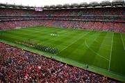 20 July 2025; The Cork and Tipperary teams march behind the Artane School of Music band before the GAA Hurling All-Ireland Senior Championship final match between Cork and Tipperary at Croke Park in Dublin. Photo by David Fitzgerald/Sportsfile