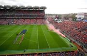 20 July 2025; The Cork and Tipperary teams march behind the Artane School of Music band before the GAA Hurling All-Ireland Senior Championship final match between Cork and Tipperary at Croke Park in Dublin. Photo by David Fitzgerald/Sportsfile