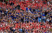 20 July 2025; Tipperary supporters celebrates a score during the GAA Hurling All-Ireland Senior Championship final match between Cork and Tipperary at Croke Park in Dublin. Photo by Stephen McCarthy/Sportsfile