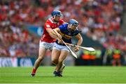 20 July 2025; Jason Forde of Tipperary in action against Seán O'Donoghue of Cork during the GAA Hurling All-Ireland Senior Championship final match between Cork and Tipperary at Croke Park in Dublin. Photo by Stephen McCarthy/Sportsfile