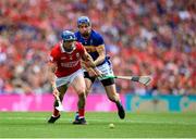 20 July 2025; Seán O'Donoghue of Cork in action against John McGrath of Tipperary during the GAA Hurling All-Ireland Senior Championship final match between Cork and Tipperary at Croke Park in Dublin. Photo by Stephen McCarthy/Sportsfile
