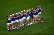 20 July 2025; The Tipperary team stand for Amhrán na bhFiann before the GAA Hurling All-Ireland Senior Championship final match between Cork and Tipperary at Croke Park in Dublin. Photo by David Fitzgerald/Sportsfile
