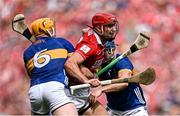 20 July 2025; Brian Hayes of Cork in action against Tipperary players Ronan Maher, left, and Willie Connors during the GAA Hurling All-Ireland Senior Championship final match between Cork and Tipperary at Croke Park in Dublin. Photo by Seb Daly/Sportsfile